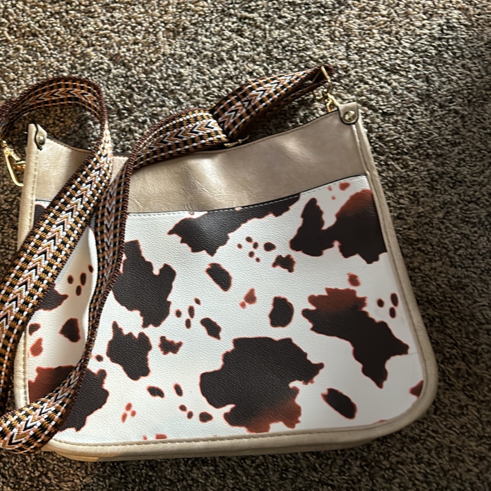 Brand new without tags cowprint cross body